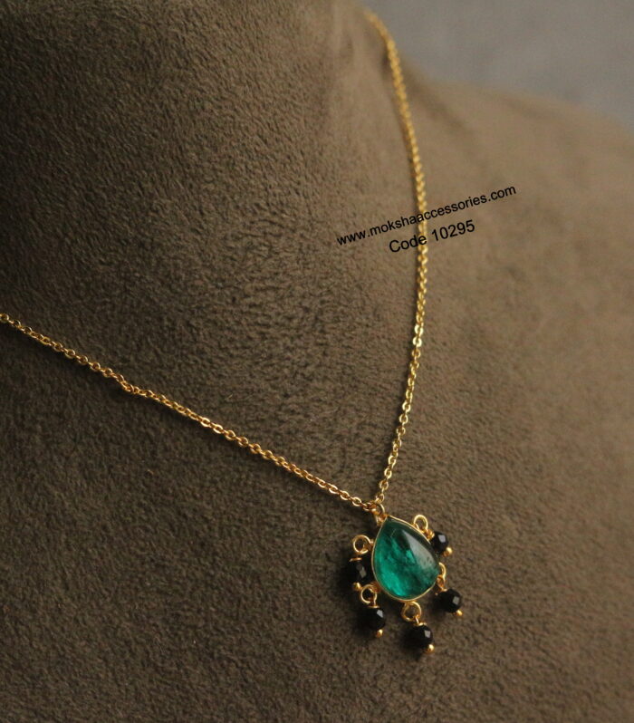 Gold chain with cz pendant and black drops