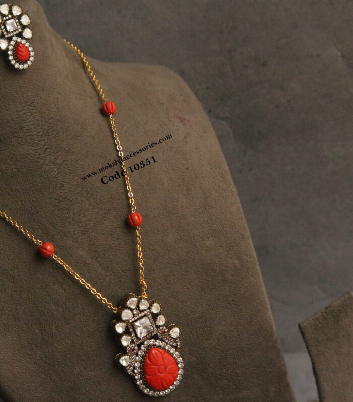 Carving coral and mozonite stone pendant set and gold chain