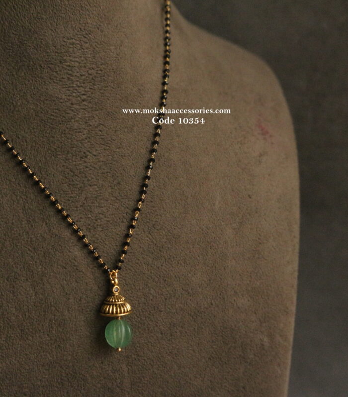 Black beads with nakshi pendant and pumpkin drop