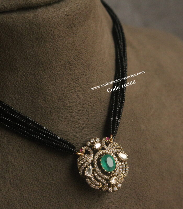 Mozonite stone pendant with black beads