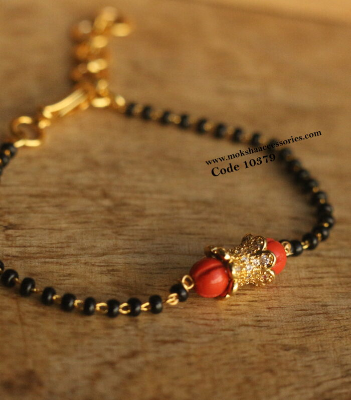 Black beads bracelet with cz pendant and corals
