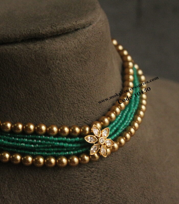 CZ choker with gold sarvoski pearls and emerald beads