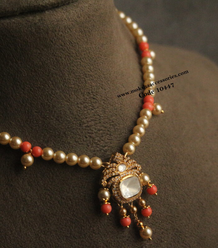 Mozonite stone pendant with sarvoski pearls and corals
