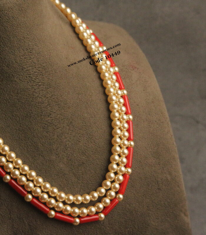 Coral and sarvoski pearl mala