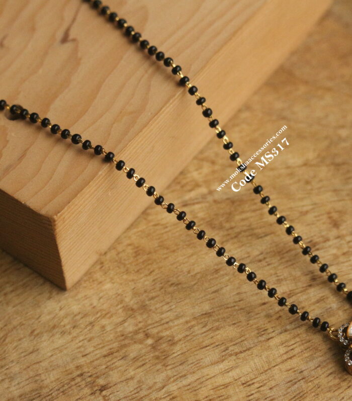 92.5 silver black beads chain with mozonite stone pendant ( Pendant 3.5 gms, Black beads 3.1 grams)