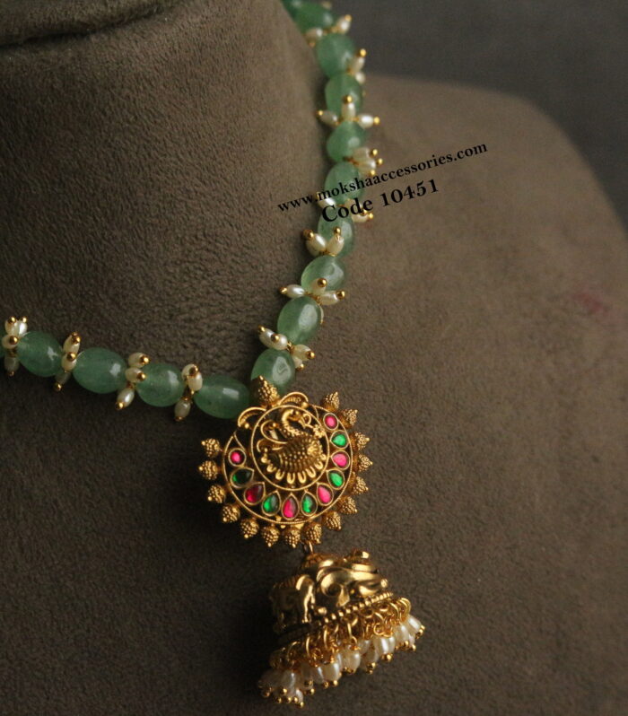 Nakshi multicolor jhumki pendant with onyx and rice pearl necklace