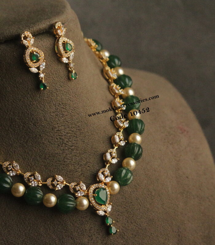 CZ diamond alike pumpkin and sarvoski pearl neckset
