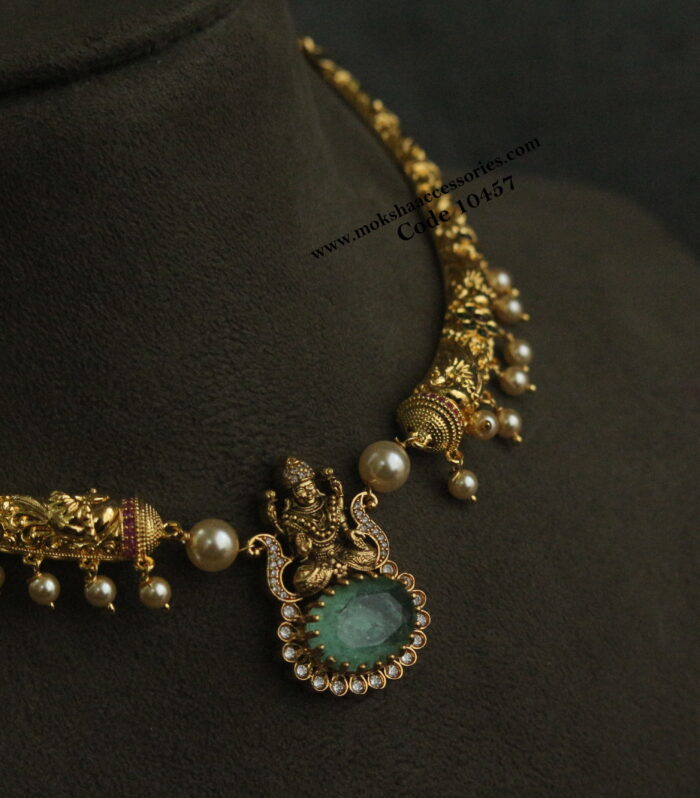 Gold hasli with lakshmi devi pendant