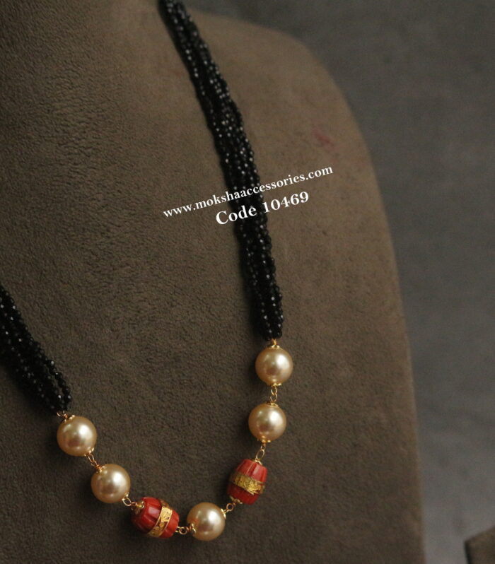Corals and black beads with sarvoski pearls