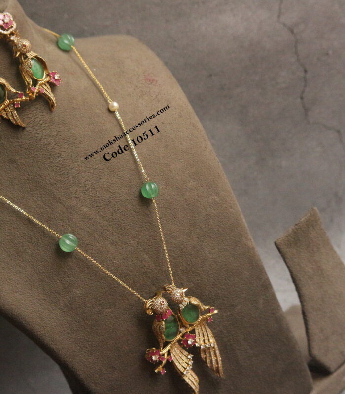 Bird cz pendant set with gold chain and pumpkin beads