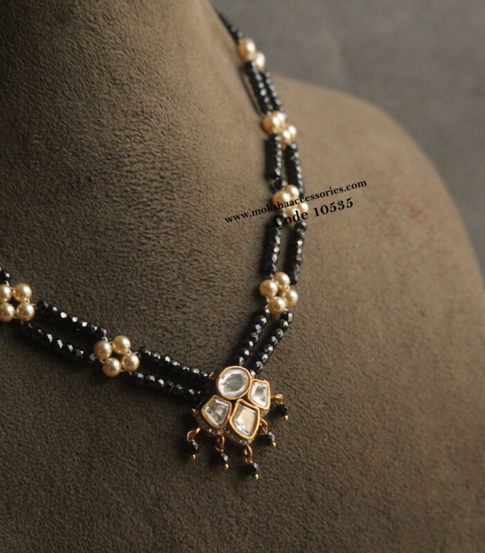 Mozonite stone pendant with sarvoski pearl and black real cz beads