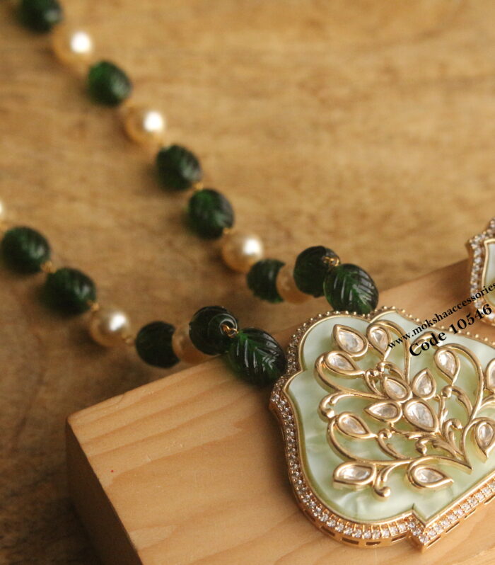 Pearl shell pendant set with onyx and sarvoski pearl mala
