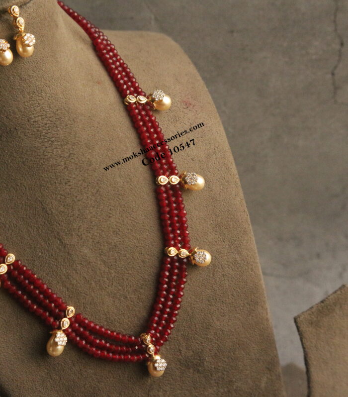 CZ pendants with ruby marroon beads