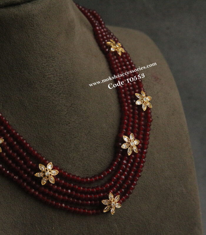 Ruby marroon beads with cz flower pendants