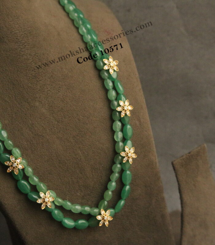 CZ flower pendants with onyx beads
