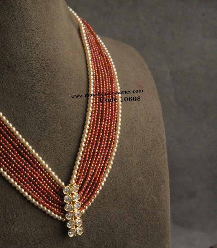 CZ pendant with sarvoski pearls and onyx coral beads
