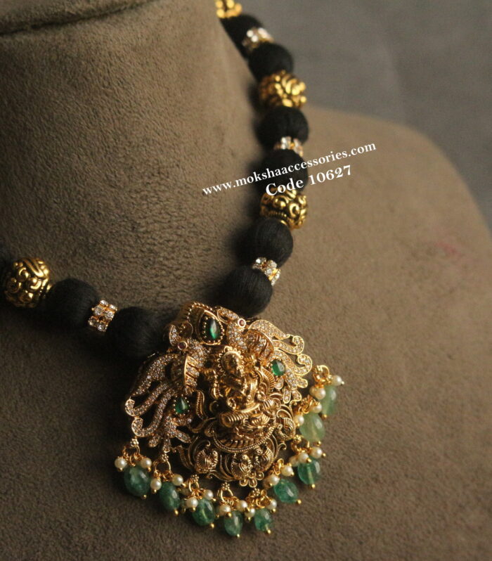 Lakshmi devi pendant with cz rings and nakshi balls