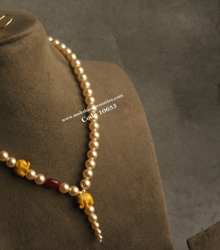 Elephants with sarvoski pearls and onyx ruby beads