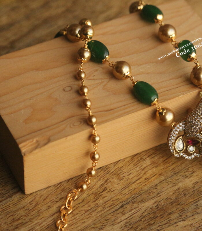 CZ elephant pendant with gold sarvoski pearls and onyx beads