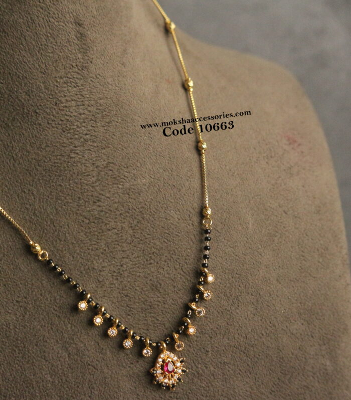CZ ruby and black stone pendant with black beads and gold chain