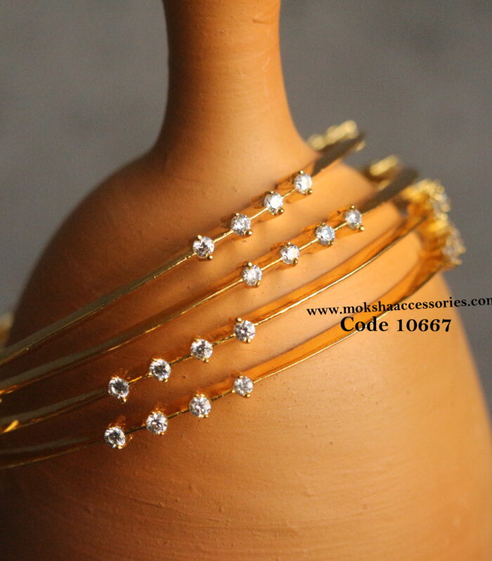 CZ gold bangles set of 4 (Available in 2.6-1, 2.4-1)