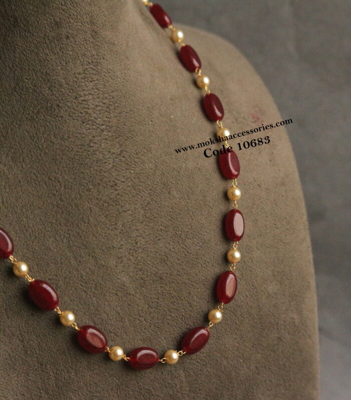 Onyx marroon beads with sarvoski pearls