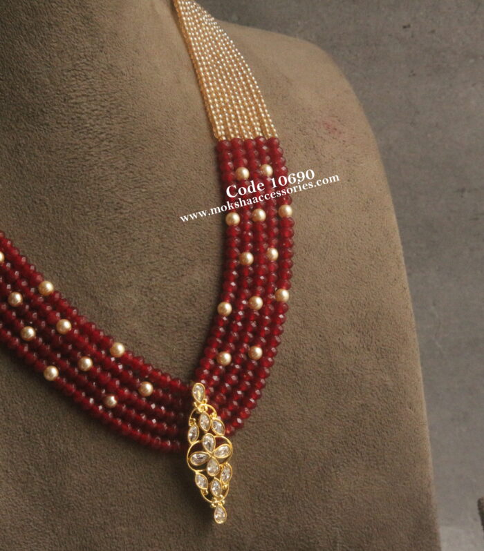 CZ pendant with onyx maroon beads and onyx gold beads
