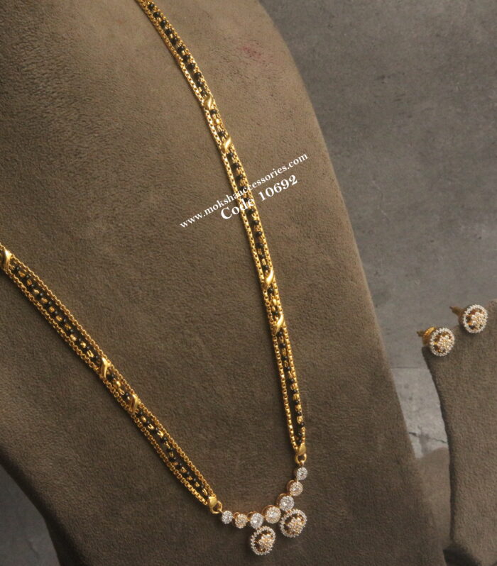 Diamond alike pendant set with black beads and gold chain haram (22 Inches length)