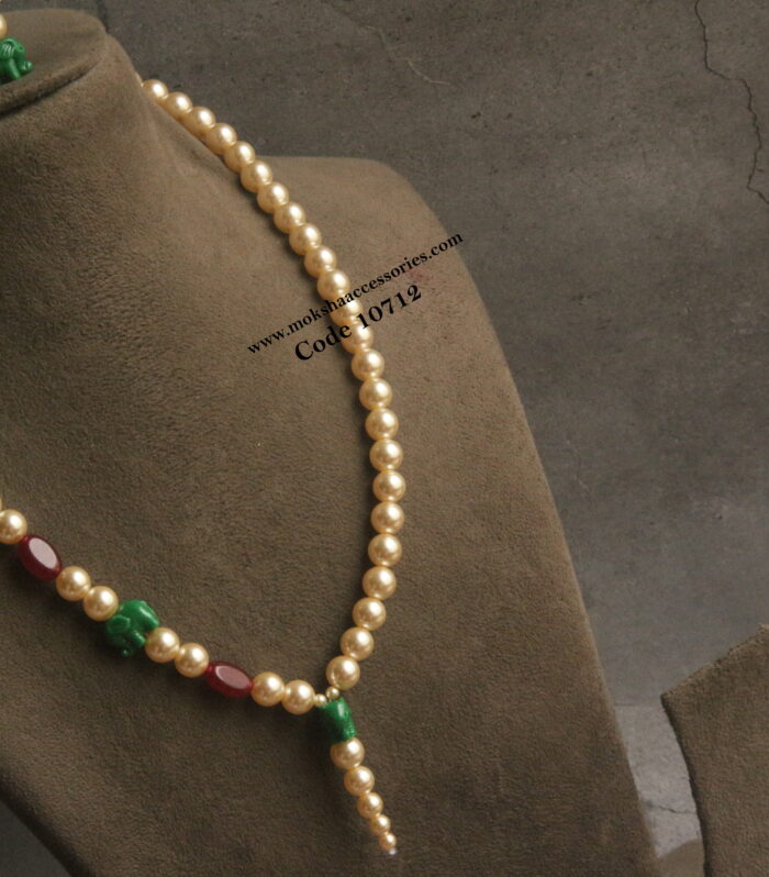 Elephant beads with sarvoski pearls and onyx beads