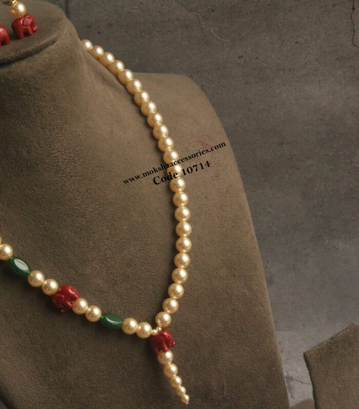 Elephant beads with sarvoski pearls and onyx beads