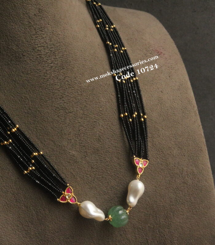 Black beads with jadaukundan pendants, russian emerald pumpkin bead and baroque pearls