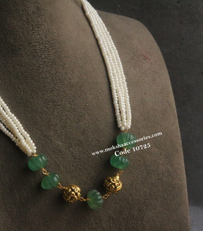 Russian emeralds with nakshi gold balls and pearls