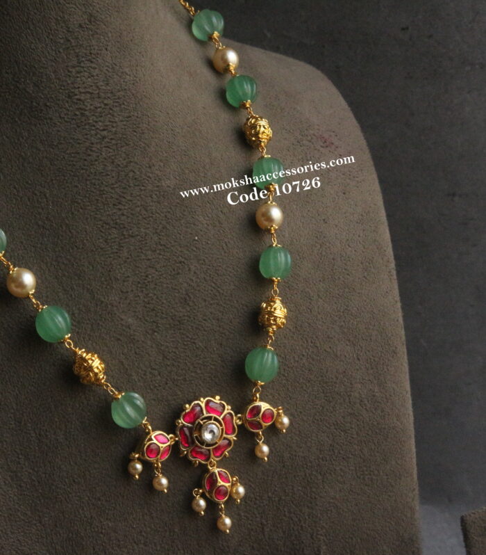 Jadaukundan pendant with pumpkin beads, gold balls, sarvoski pearls and gold chain