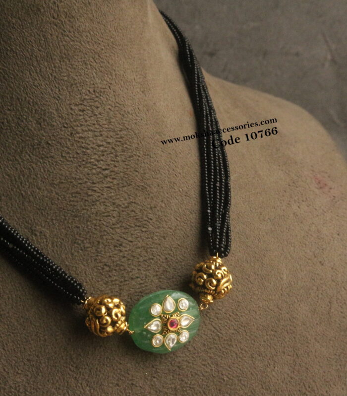 Black beads with beaded pendant and nakshi balls