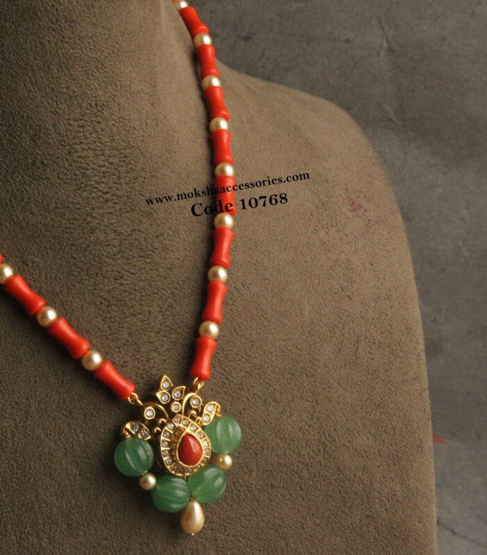 CZ coral pendant with pumpkin beads , sarvoski pearls and corals