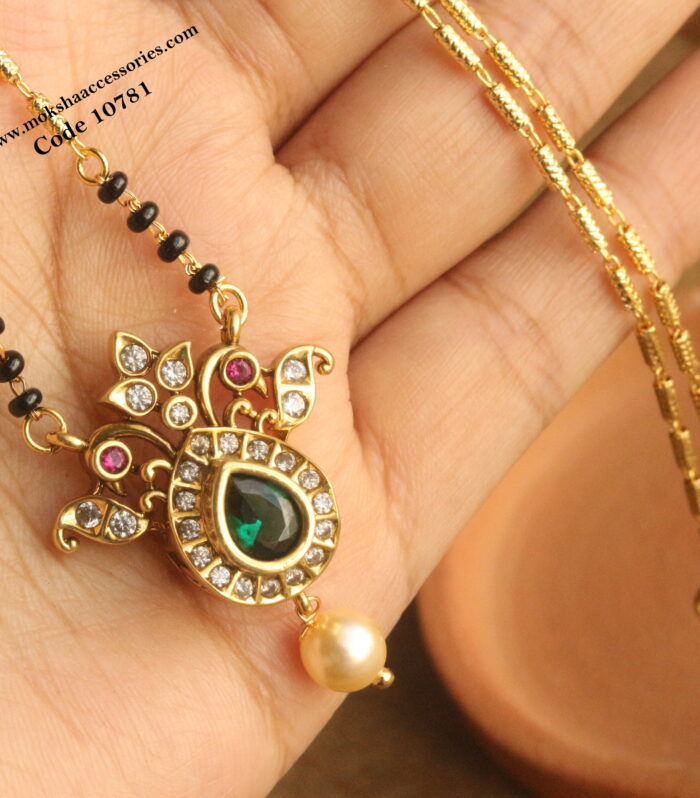 CZ emerald stone pendant with gold chain and black beads