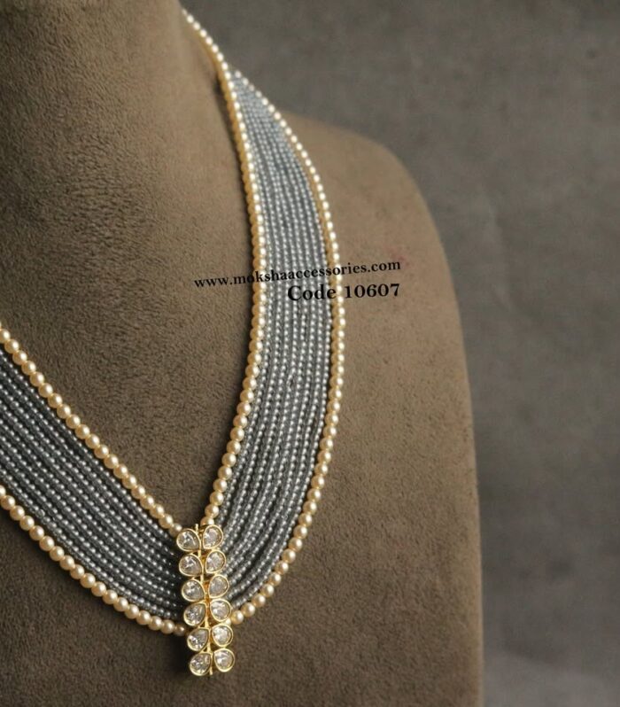 Cz pendant with sarvoski pearls and onyx beads
