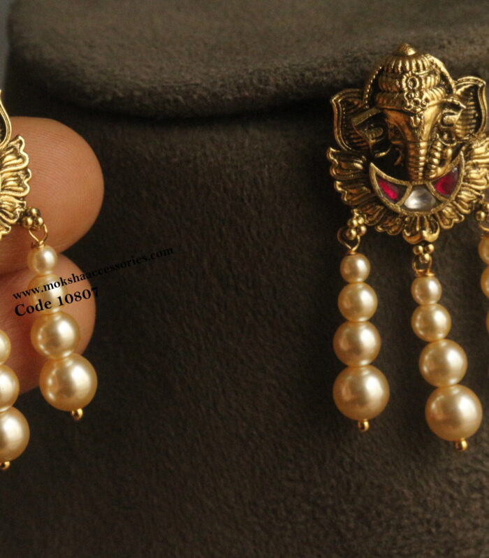 Nakshi jadaukundan earrings with sarvoski pearl drops