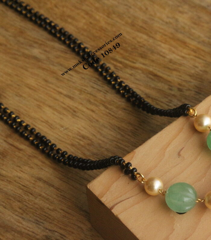 Pumpkin beads and sarvoski pearls with black beads