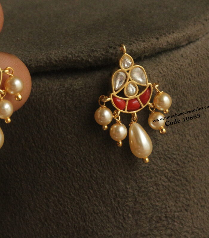 Coral jadaukundan studs with sarvoski pearl drops
