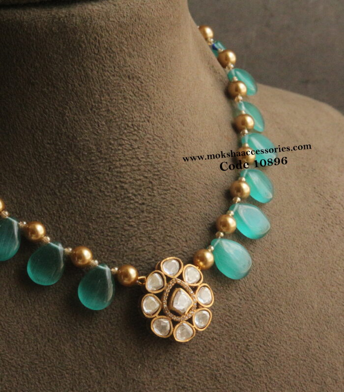 Mozonite stone pendant with onyx blue drops and sarvoski pearls
