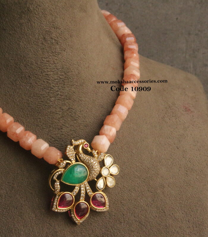 Peacock cz and mozonite stone pendant with real onyz beads