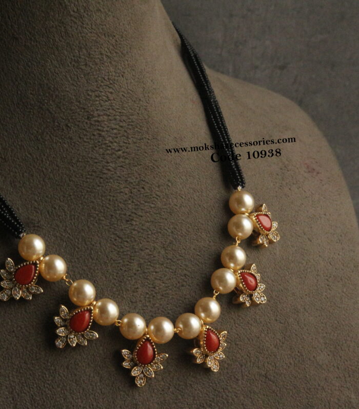 Coral pendants with black beads and sarvoski pearls