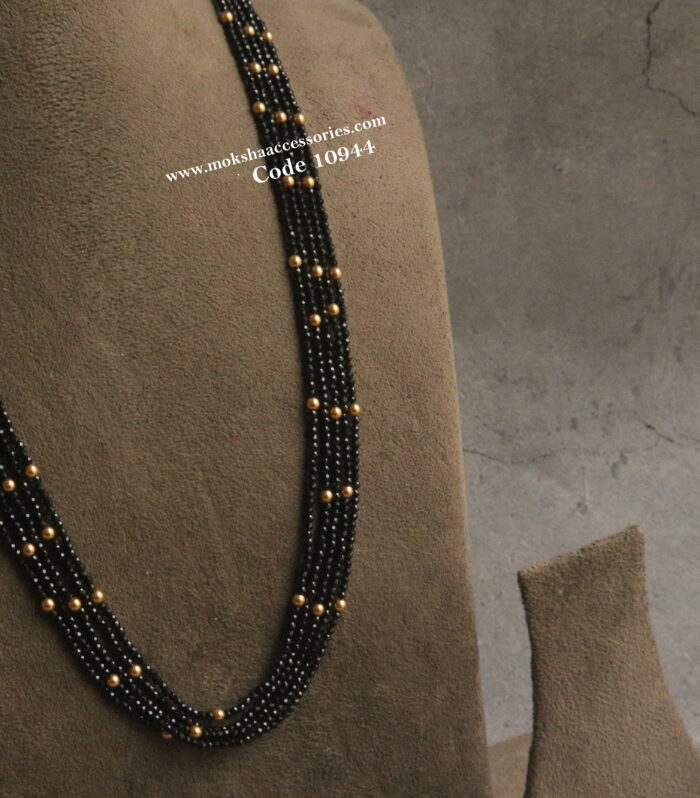 Black beads with gold sarvoski pearl mala