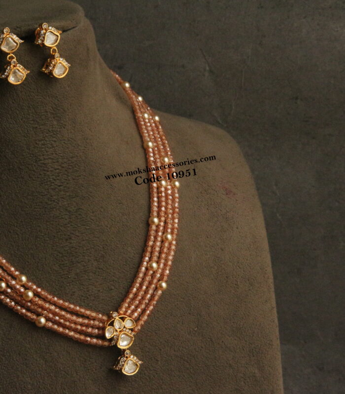Mozonite stone pendant set with cz honey color beads and sarvoski pearls