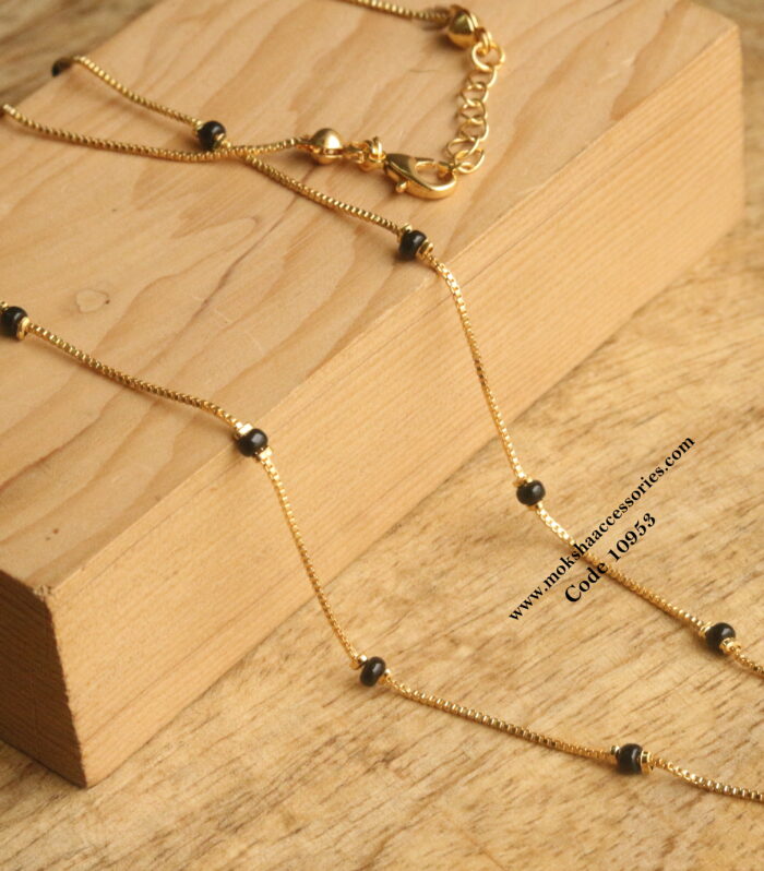 Black beads with gold chain