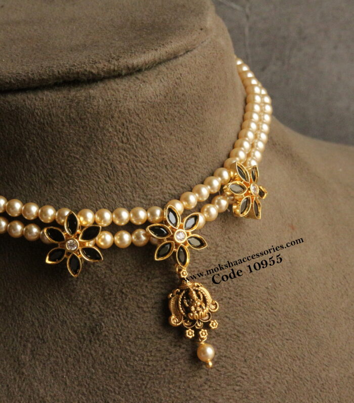 CZ black stone pendants with sarvoski pearls and nakshi lakshmi devi pendant