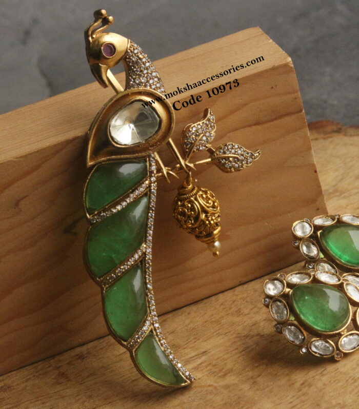 CZ and mozonite stone pendant set