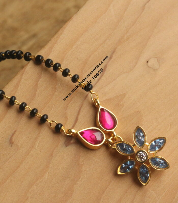 CZ blue stone pendant with jadaukundan and black beads