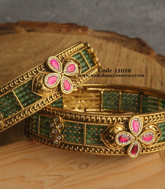Nakshi beaded open screw bangles with ruby stones (available in 2.6 )